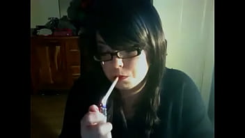 Chubby Domme Smoking A Cig In Specs